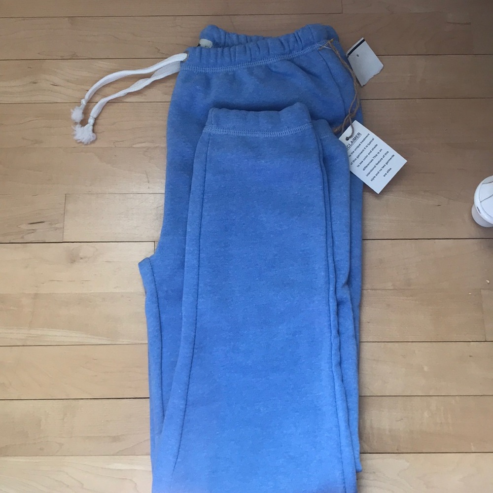 Blue sweatpants.